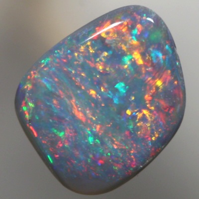 SOLID SEMI BLACK OPAL Sparkling red and orange over green blue